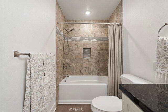 964 Calle Aragon Unit D, Laguna Woods, CA 92637 - bathroom with shower / bath combination with curtain, toilet, vanity, and wood finished floors