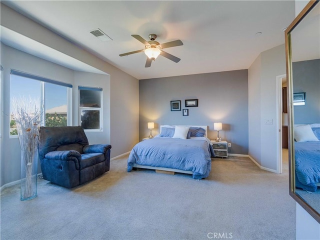 bedroom with visible vents, baseboards, and carpet floors