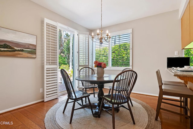 1480 Forest Knoll Dr, Oak Park, CA 91377 - dining room featuring an inviting chandelier, baseboards, and light wood-type flooring