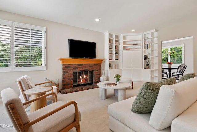 1480 Forest Knoll Dr, Oak Park, CA 91377 - carpeted living room with a brick fireplace and recessed lighting