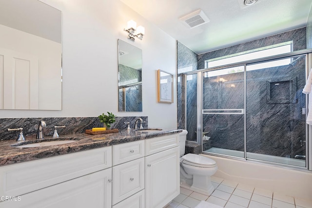 1480 Forest Knoll Dr, Oak Park, CA 91377 - bathroom with tile patterned flooring, a sink, combined bath / shower with glass door, and toilet