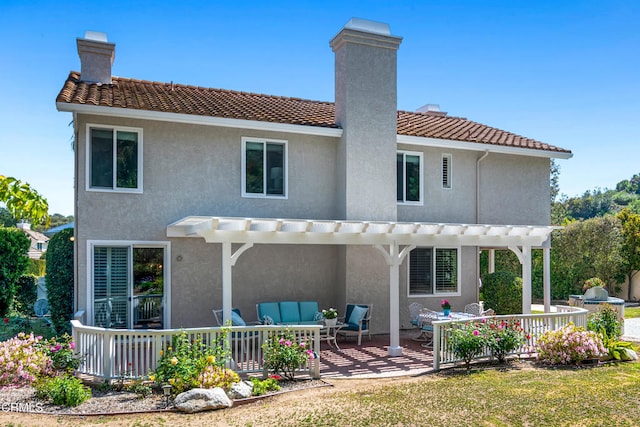 1480 Forest Knoll Dr, Oak Park, CA 91377 - rear view of house featuring a pergola, a chimney, and a patio