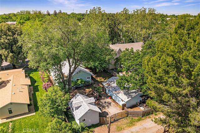 aerial view featuring a wooded view