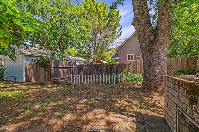 view of yard featuring fence