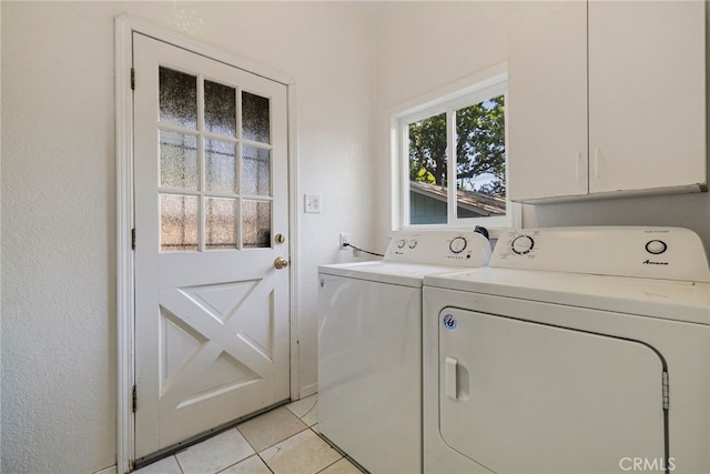 1617 Hemlock St, Chico, CA 95928 - laundry area featuring separate washer and dryer, cabinet space, and light tile patterned floors