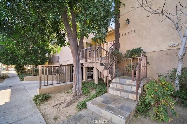 14618 Gilmore St Unit 8, Van Nuys, CA 91411 - exterior space featuring fence and stairs