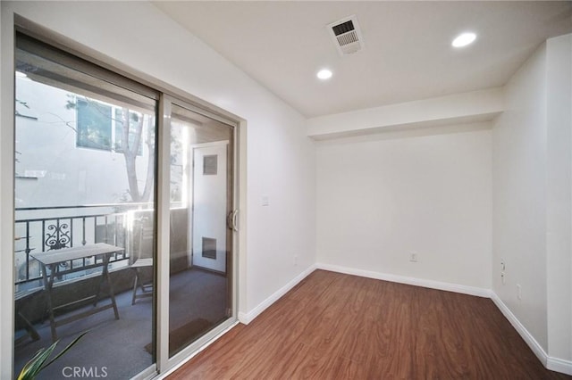14618 Gilmore St Unit 8, Van Nuys, CA 91411 - unfurnished room featuring recessed lighting, visible vents, wood finished floors, and baseboards