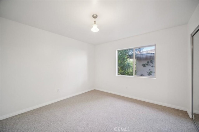 14618 Gilmore St Unit 8, Van Nuys, CA 91411 - unfurnished room featuring light colored carpet and baseboards
