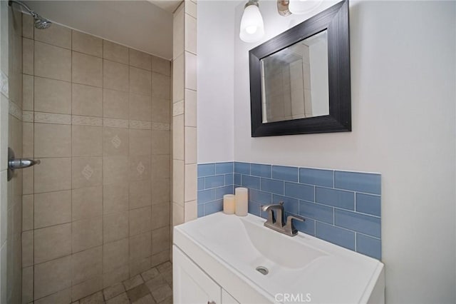 14618 Gilmore St Unit 8, Van Nuys, CA 91411 - full bath featuring a tile shower, vanity, and tile walls