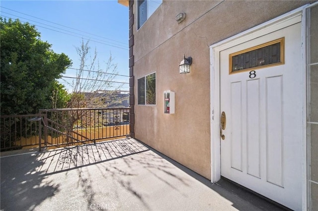 14618 Gilmore St Unit 8, Van Nuys, CA 91411 - view of exterior entry with stucco siding