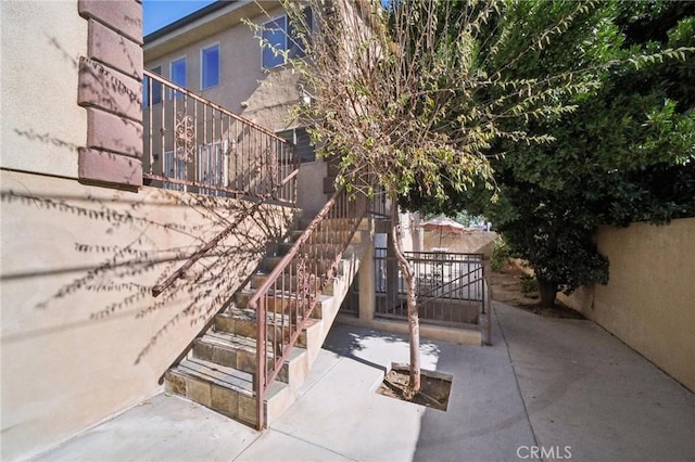 14618 Gilmore St Unit 8, Van Nuys, CA 91411 - view of patio with fence and stairway