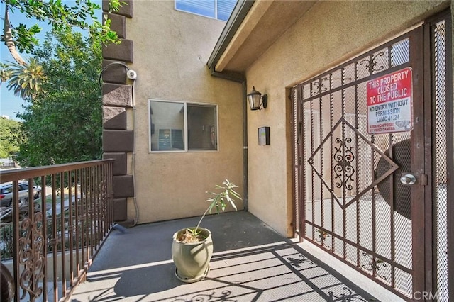 14618 Gilmore St Unit 8, Van Nuys, CA 91411 - entrance to property featuring stucco siding and a balcony