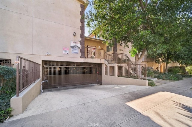 14618 Gilmore St Unit 8, Van Nuys, CA 91411 - view of gate with stairway and fence
