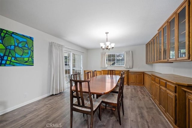 259 Saint Andrews Way, Lompoc, CA 93436 - dining area featuring a chandelier and dark wood-style floors