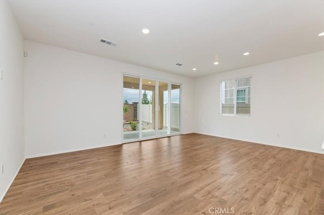 467 Daniella Way, Perris, CA 92570 - empty room with light wood-style floors and recessed lighting