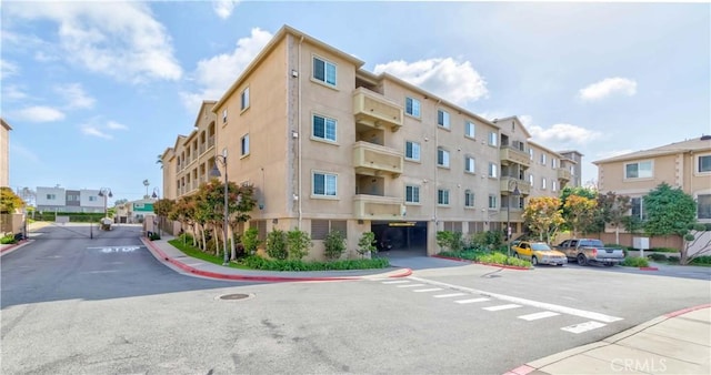 1437 Lomita Blvd Unit 227, Harbor City, CA 90710 - view of building exterior featuring uncovered parking