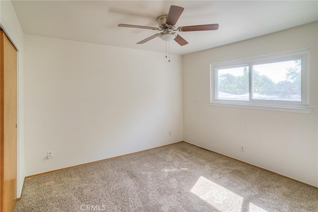 12 Linda Loma Dr, Oroville, CA 95966 - unfurnished room with light colored carpet, a ceiling fan, and baseboards