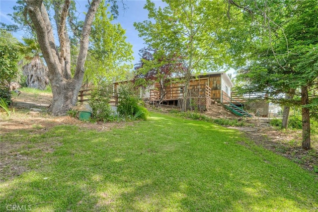 12 Linda Loma Dr, Oroville, CA 95966 - view of yard featuring stairs and a wooden deck