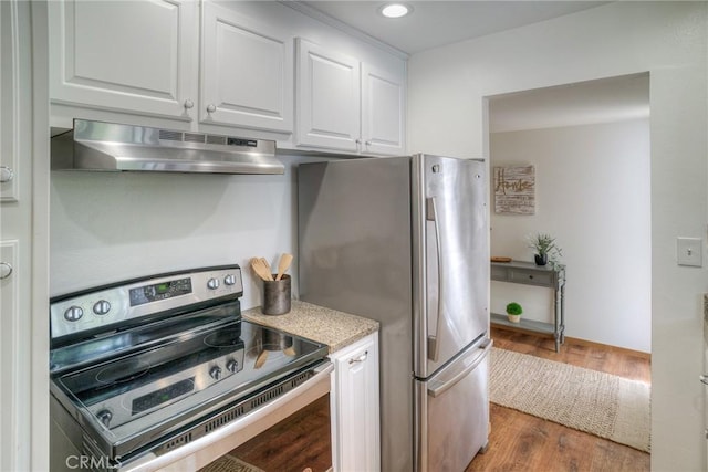 12 Linda Loma Dr, Oroville, CA 95966 - kitchen featuring white cabinets, appliances with stainless steel finishes, under cabinet range hood, recessed lighting, and wood finished floors