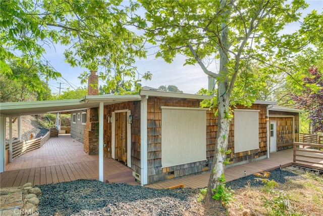 12 Linda Loma Dr, Oroville, CA 95966 - exterior space featuring a chimney and a wooden deck