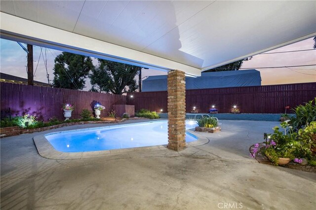 view of pool with a fenced in pool, a patio area, and a fenced backyard