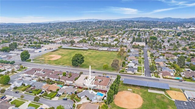 drone / aerial view featuring a mountain view and a residential view