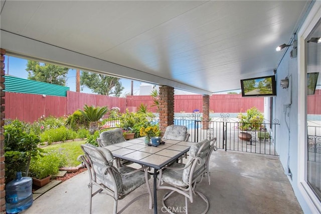 view of patio / terrace featuring a fenced backyard and outdoor dining area