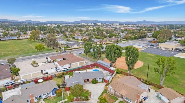 bird's eye view with a residential view and a mountain view