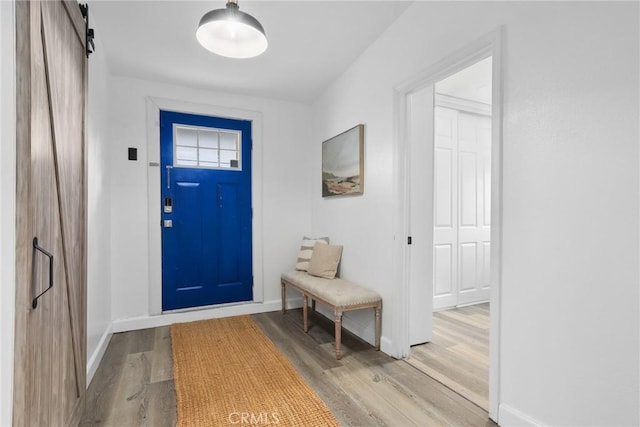 4338 Beagle St, Los Angeles, CA 90032 - doorway with light wood-style flooring and baseboards