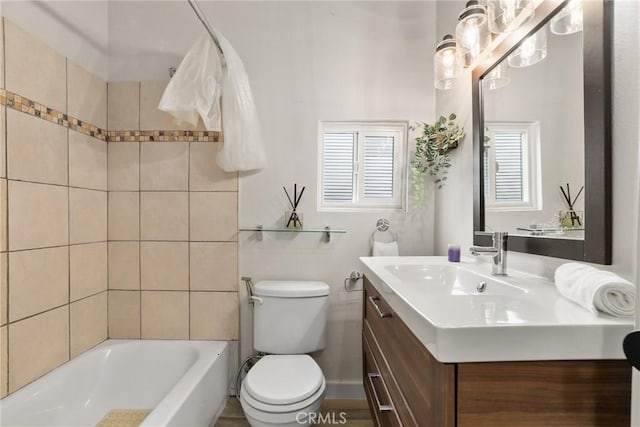 4338 Beagle St, Los Angeles, CA 90032 - bathroom featuring toilet, vanity, plenty of natural light, and tub / shower combination