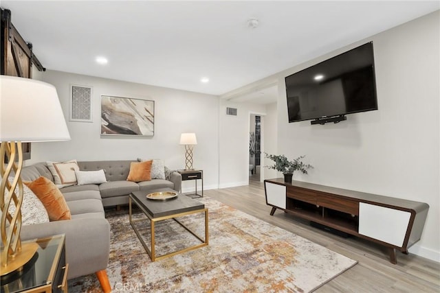 4338 Beagle St, Los Angeles, CA 90032 - living area with wood finished floors, baseboards, and recessed lighting