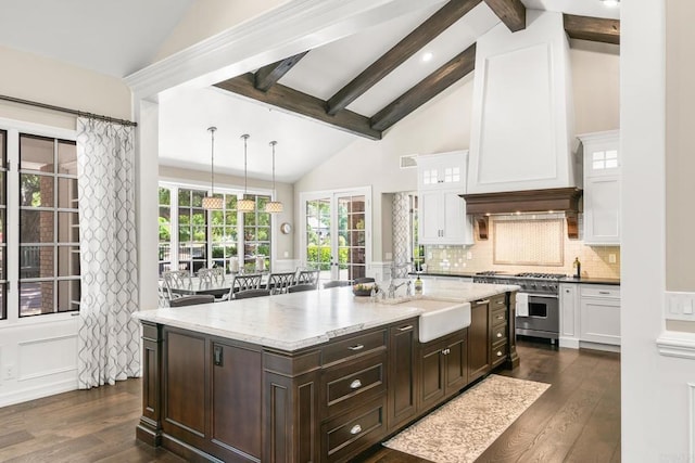 5135 Island Forest Pl, Westlake Village, CA 91362 - kitchen with white cabinetry, high end stainless steel range, a sink, and dark wood-type flooring