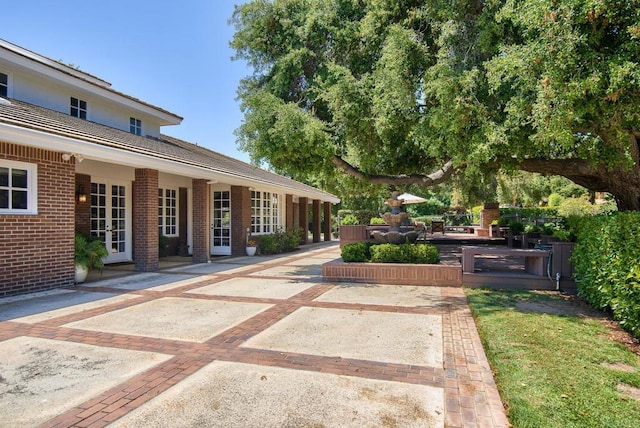 5135 Island Forest Pl, Westlake Village, CA 91362 - view of yard featuring french doors and a patio area