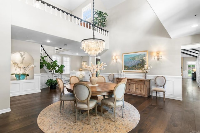 5135 Island Forest Pl, Westlake Village, CA 91362 - dining space featuring wainscoting, a decorative wall, a notable chandelier, and hardwood / wood-style floors