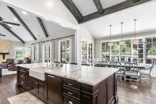 5135 Island Forest Pl, Westlake Village, CA 91362 - kitchen with dark wood-style flooring, beam ceiling, open floor plan, ceiling fan, and a sink
