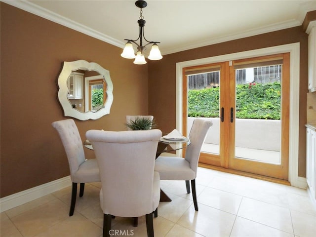 4911 Browndeer Ln, Rancho Palos Verdes, CA 90275 - dining room featuring ornamental molding, french doors, a chandelier, baseboards, and light tile patterned floors