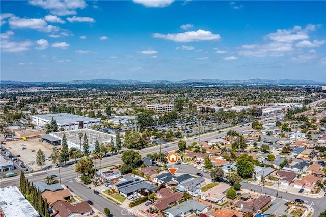 birds eye view of property featuring a mountain view