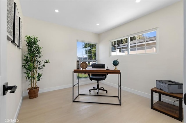 office area with recessed lighting, baseboards, and light wood-style floors