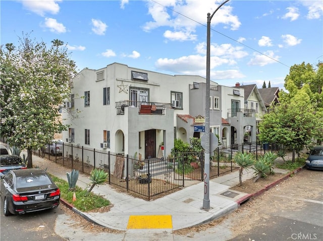 view of building exterior featuring fence private yard