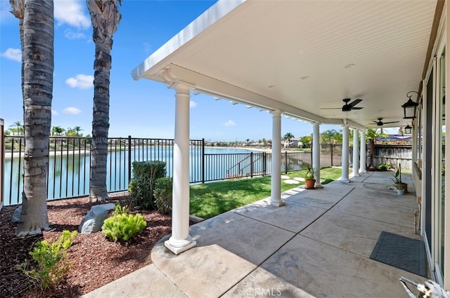 29855 Bay View Way, Menifee, CA 92584 - view of patio with a fenced backyard, a ceiling fan, and a water view