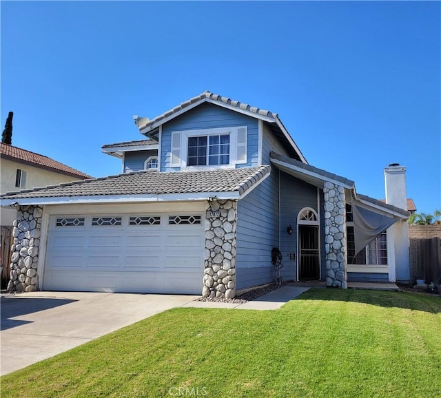 traditional-style house with a chimney, a tiled roof, fence, driveway, and a front yard