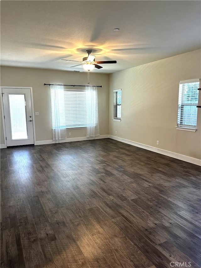16 Petaluma Ct, Chico, CA 95926 - empty room with a ceiling fan, dark wood-style flooring, and baseboards