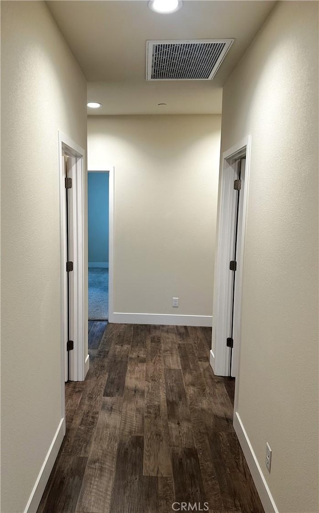 16 Petaluma Ct, Chico, CA 95926 - corridor featuring dark wood-style floors, baseboards, and recessed lighting