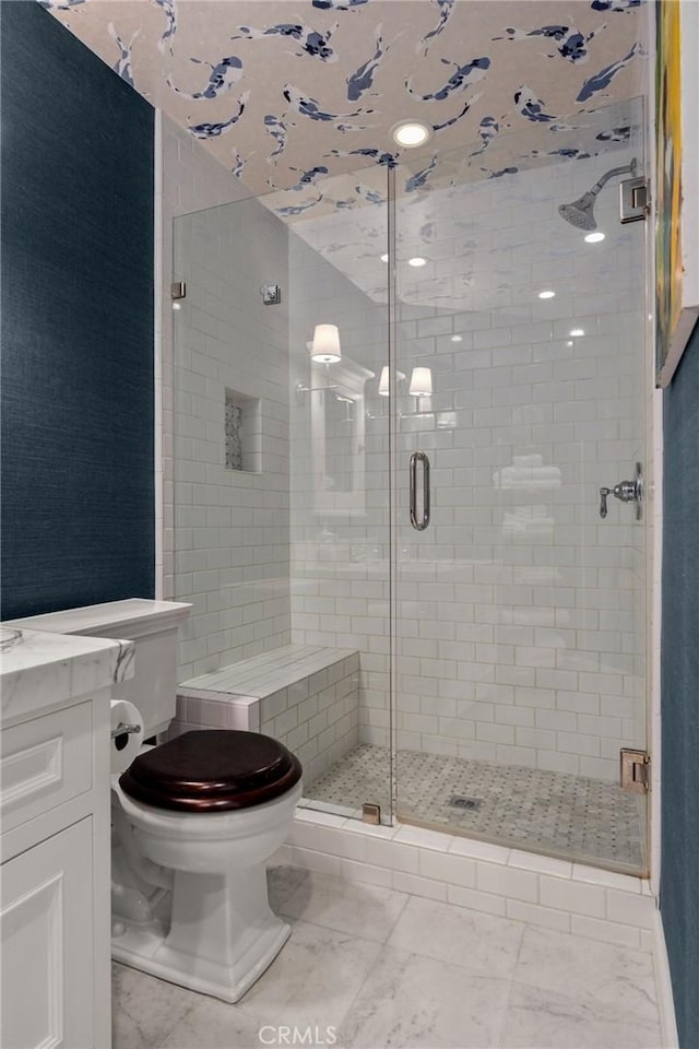 full bathroom with toilet, a shower stall, and marble finish floor
