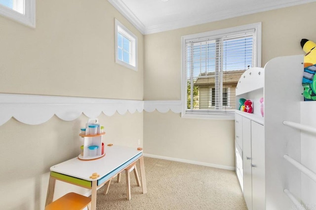 game room with crown molding and baseboards