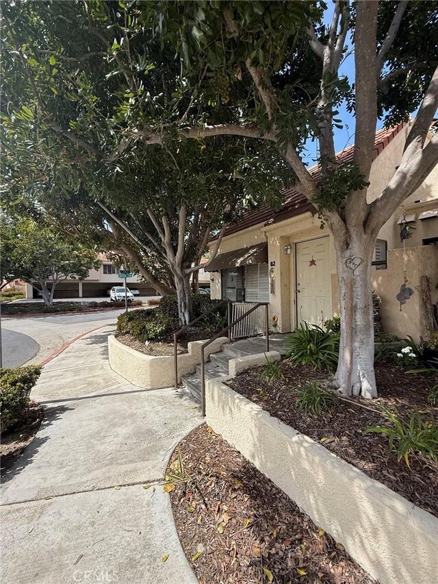 82 Largo St, Laguna Niguel, CA 92677 - view of front facade with stucco siding