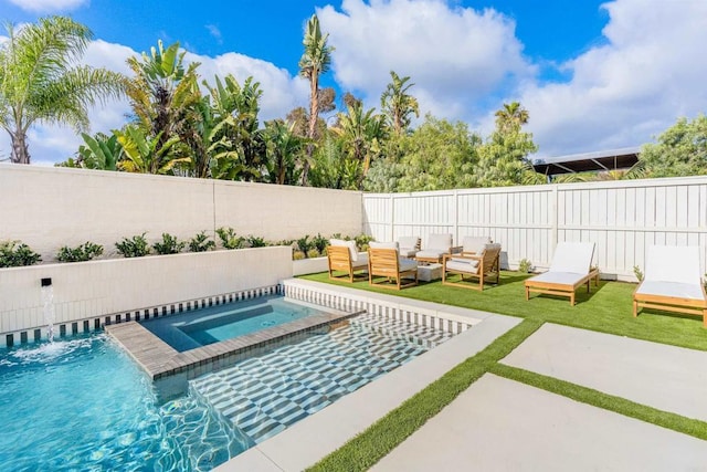view of pool featuring a fenced in pool, a patio area, an in ground hot tub, and a fenced backyard