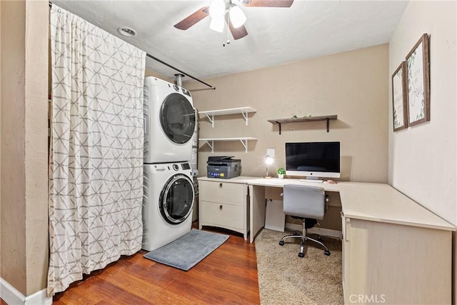 7440 Shale Rock Rd, Paso Robles, CA 93446 - office space featuring stacked washer and clothes dryer, wood finished floors, a ceiling fan, built in desk, and baseboards