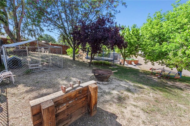 7440 Shale Rock Rd, Paso Robles, CA 93446 - view of yard featuring a trampoline and an outdoor structure