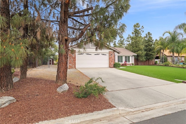 28646 Patti Ln, Menifee, CA 92585 - view of front facade featuring a garage, driveway, and brick siding